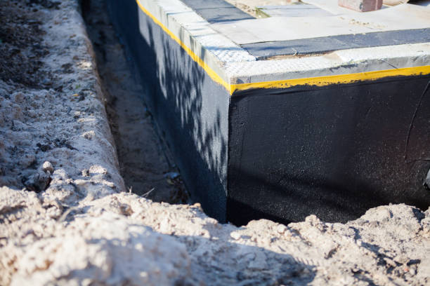 Professional Waterproofing technician working in Sidney, IL